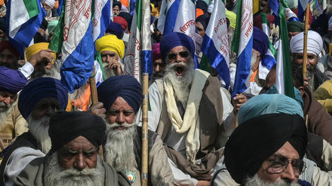 Indian farmers protest new US trade deal.