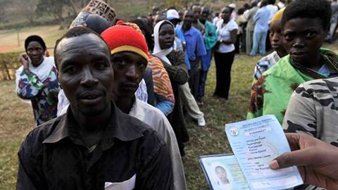 Voters wait in line in Rwanda