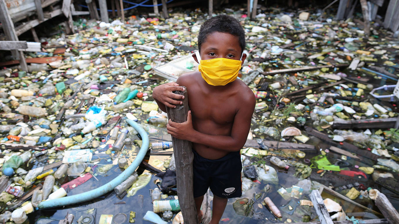 brown66_MICHAEL DANTASAFP via Getty Images_brazilchildcoronaviruspollution