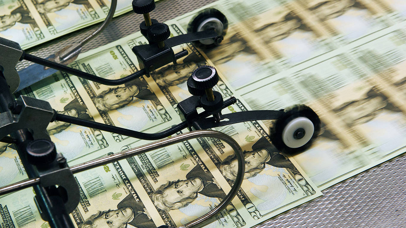 hamada50_PAUL J. RICHARDSAFP via Getty Images_printing money
