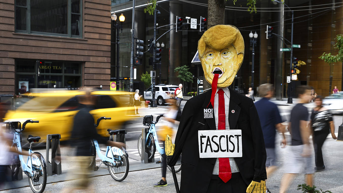 acemoglu15_Bilgin S. SasmazAnadolu AgencyGetty Images_trumpfascistposter