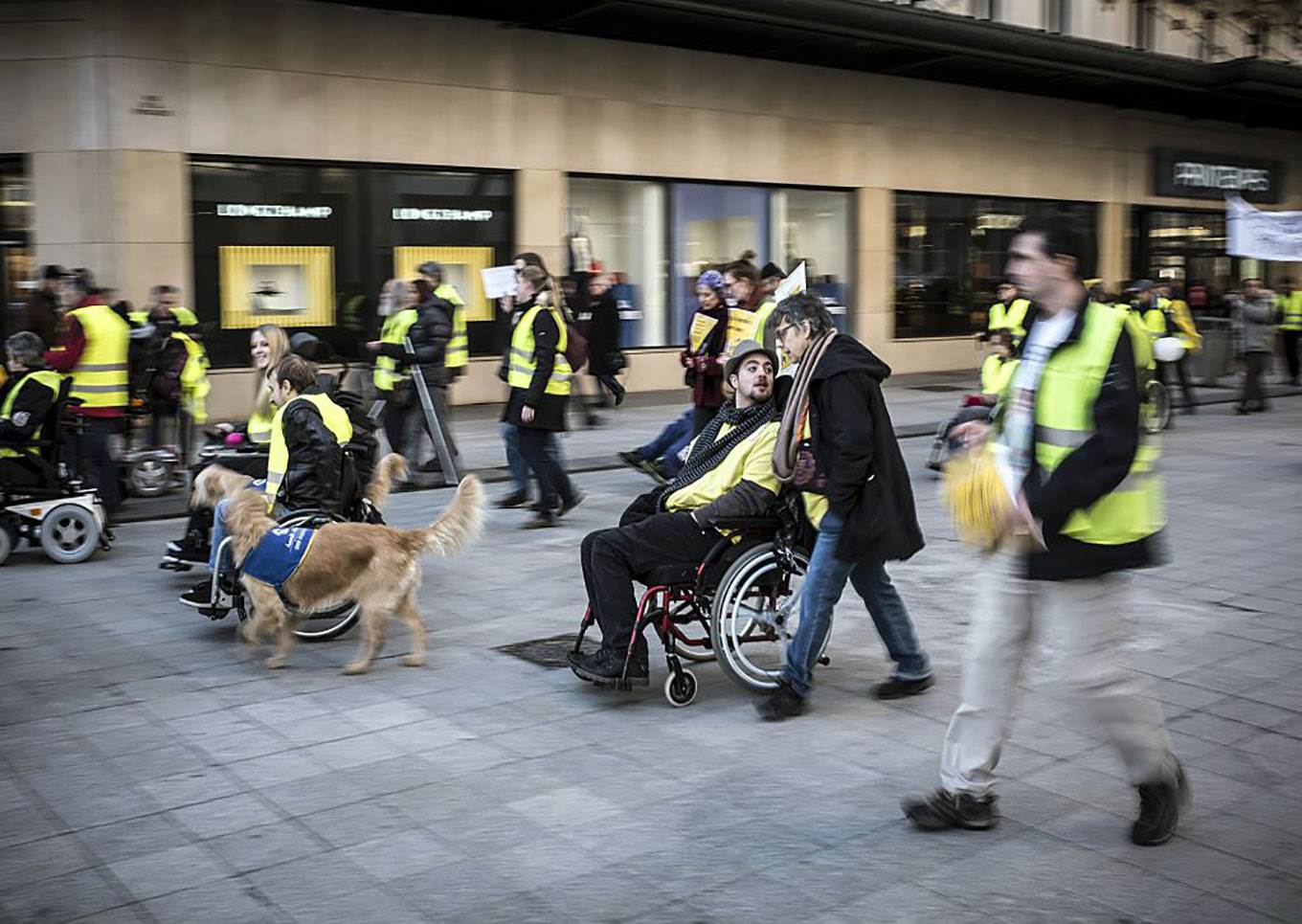 people in wheelchairs disabled access
