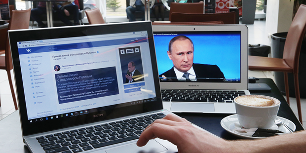 Watching a live broadcast of Russian President Vladimir Putin's annual question session