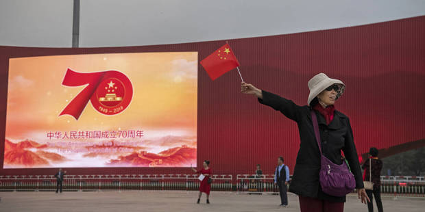 sheng93_Kevin FrayerGetty Images_china70thwomanflag