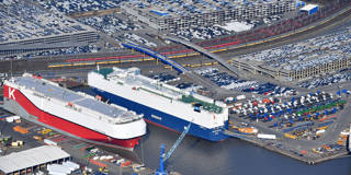 Cars destined for export stand at Bremerhaven port 