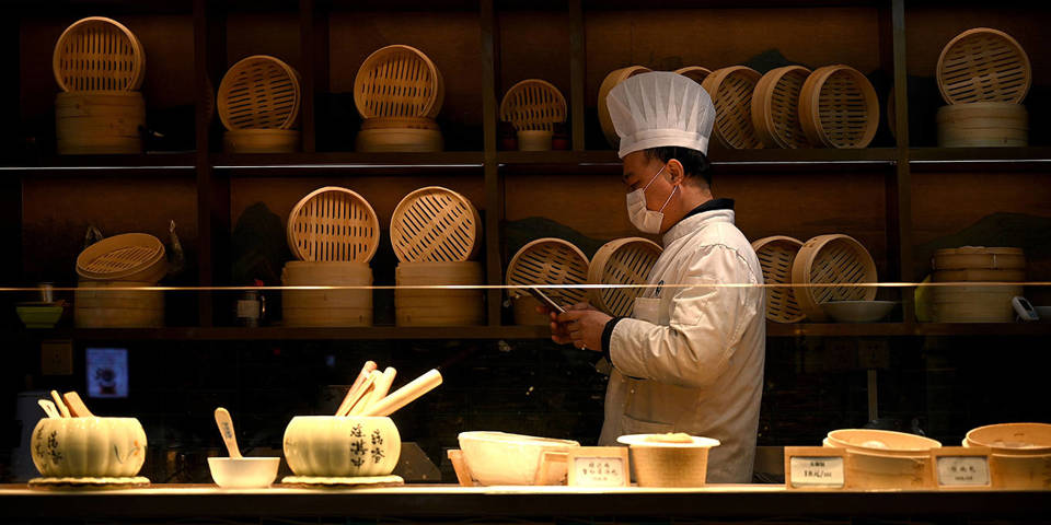 zhang42_NOEL CELISAFP via Getty Images_chinaworkercoronavirus