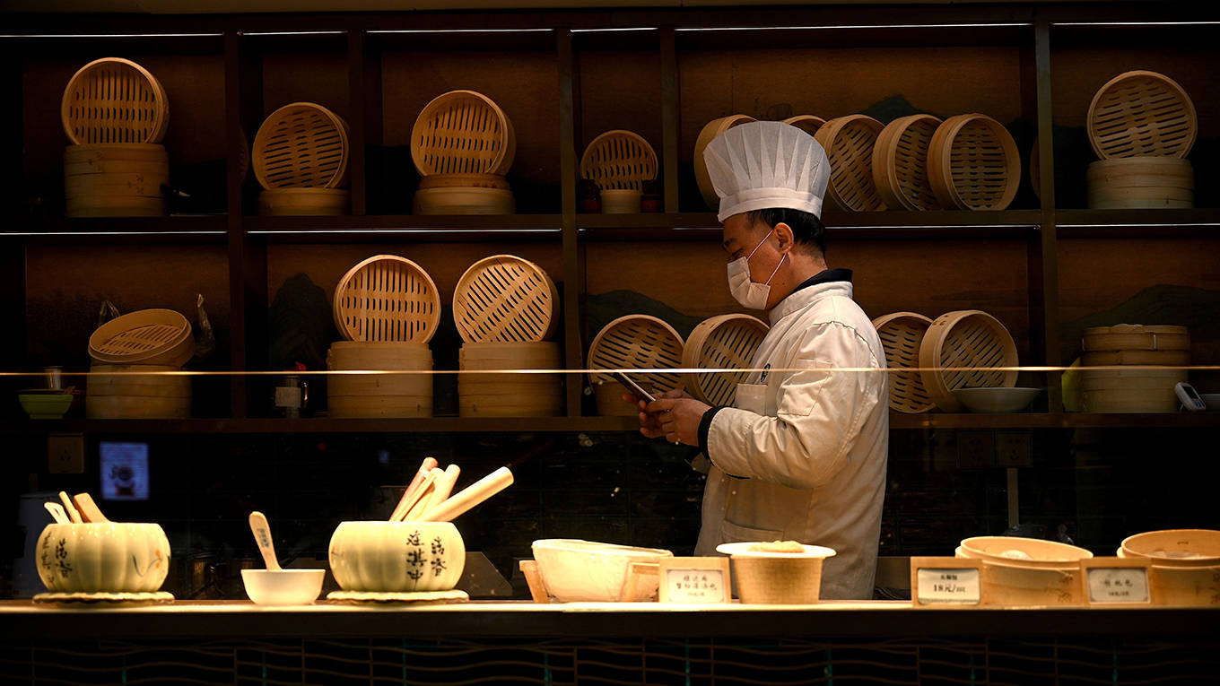 zhang42_NOEL CELISAFP via Getty Images_chinaworkercoronavirus