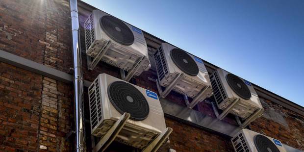 icampbell1_DIRK WAEMAFP via Getty Images_air conditioning