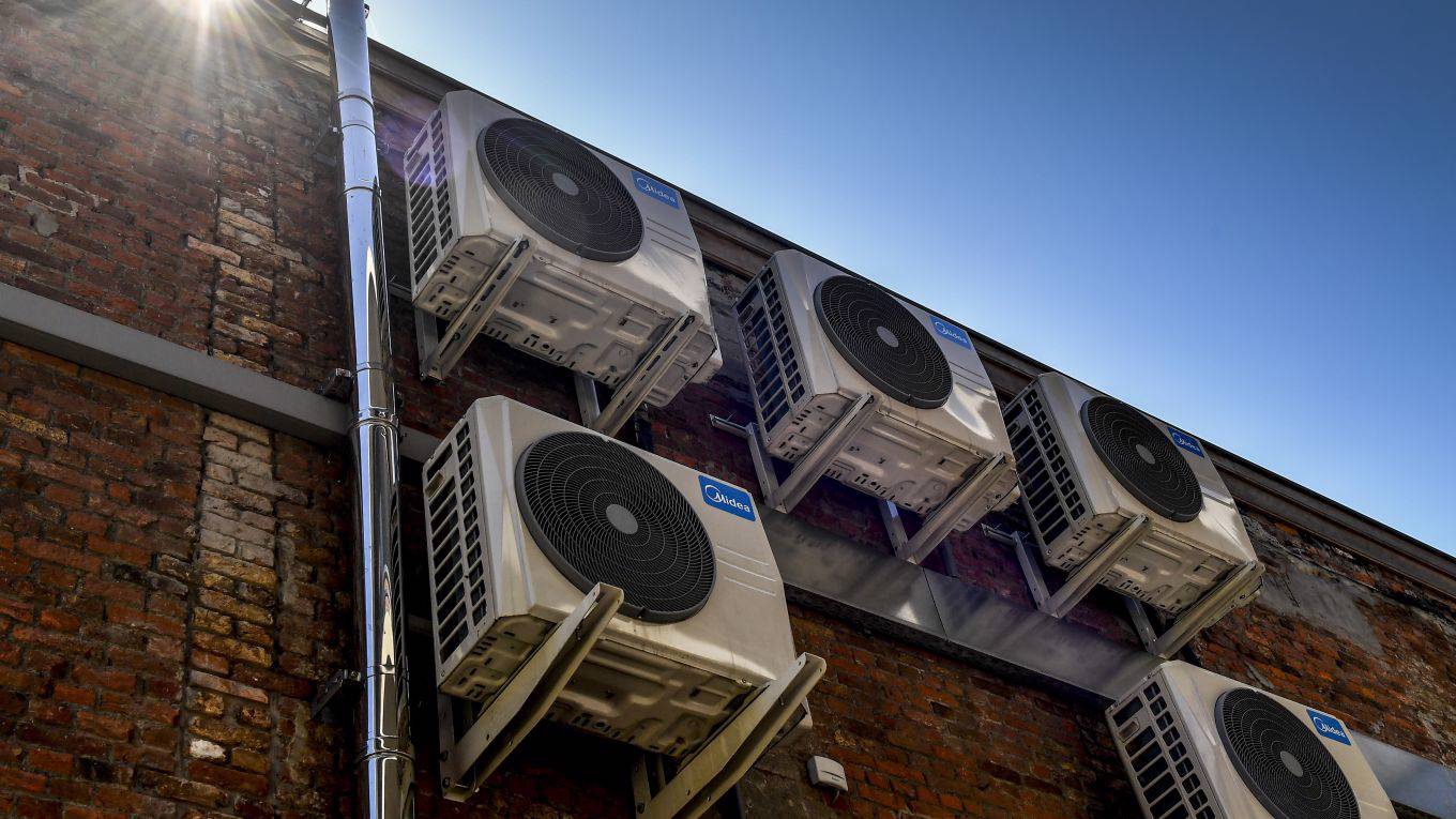 icampbell1_DIRK WAEMAFP via Getty Images_air conditioning