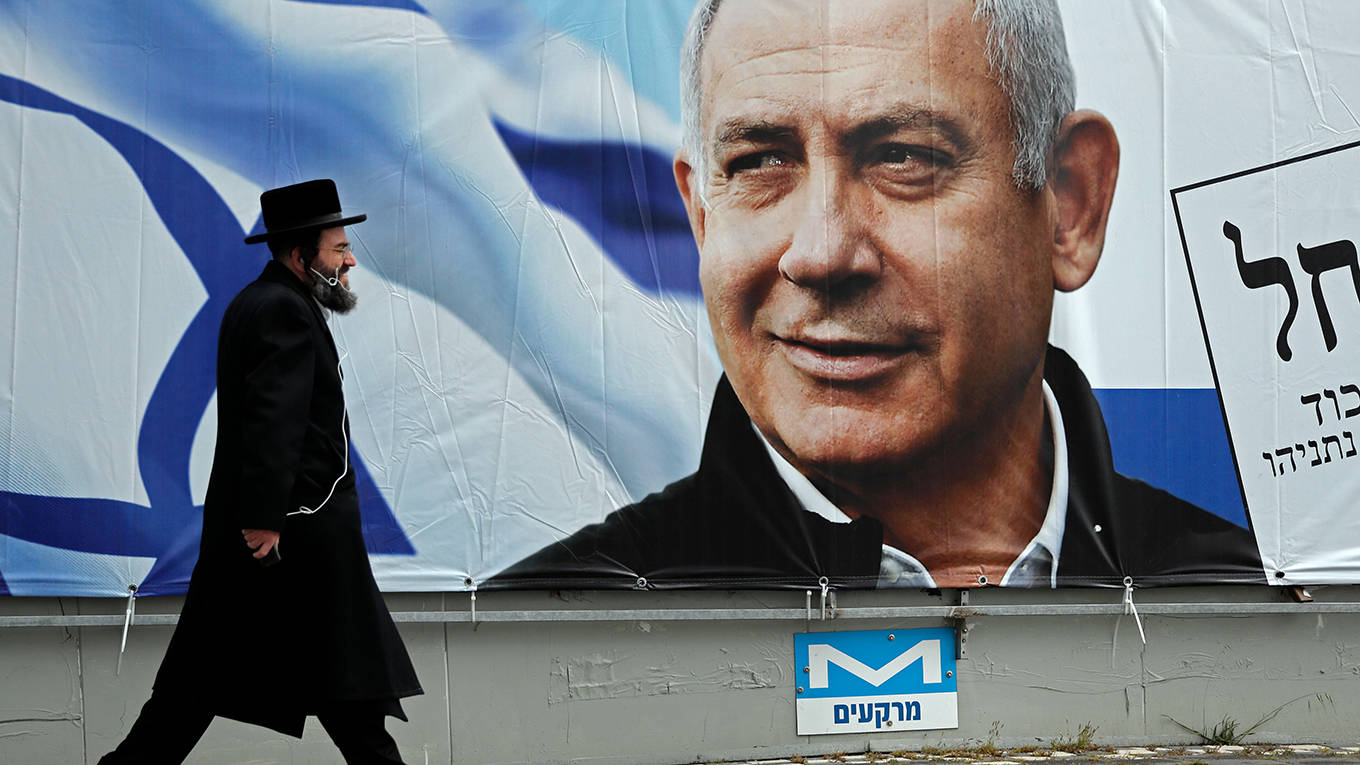 moisi170_THOMAS COEXAFP via Getty Images_israelelectionnetanyahuposter