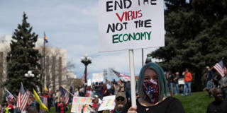 boskin70_JASON CONNOLLYAFP via Getty Images_coronavirusUSlockdownprotest