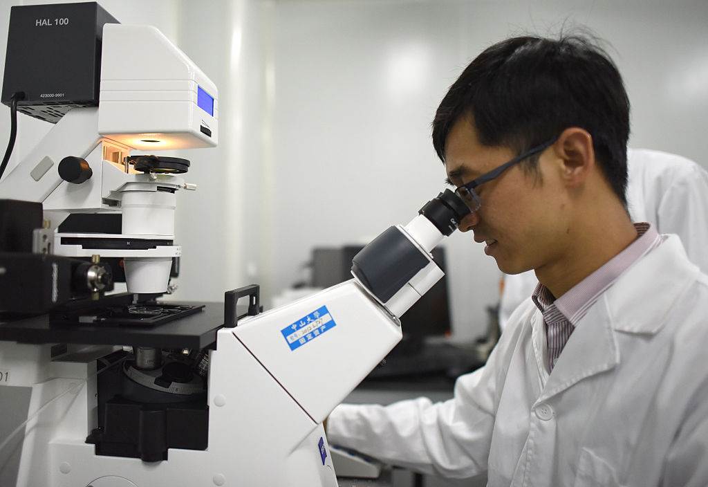 Researchers in lab where the first gene edited embryo was made