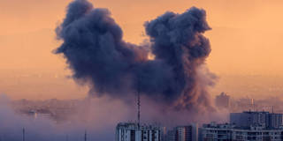 Missile strike in Iran city.