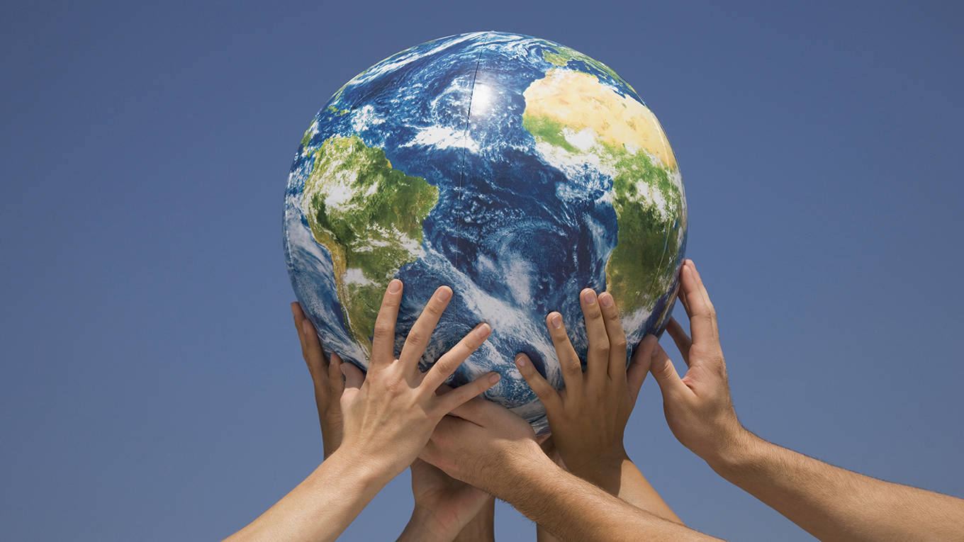 rogoff208_Tetra ImagesGetty Images_worldglobehandscooperation