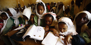 Sudanese girls sit in a classroom