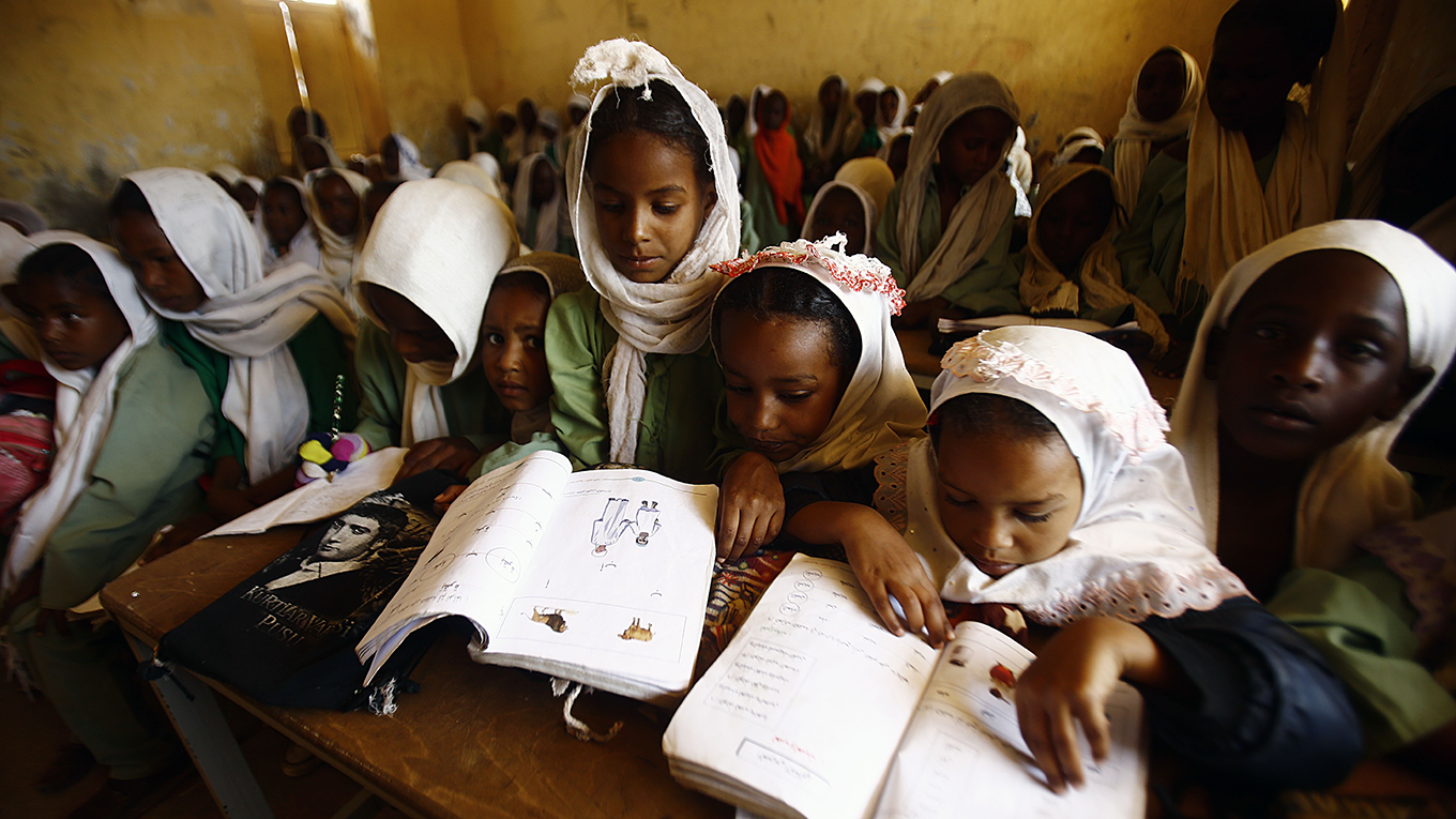 Sudanese girls sit in a classroom