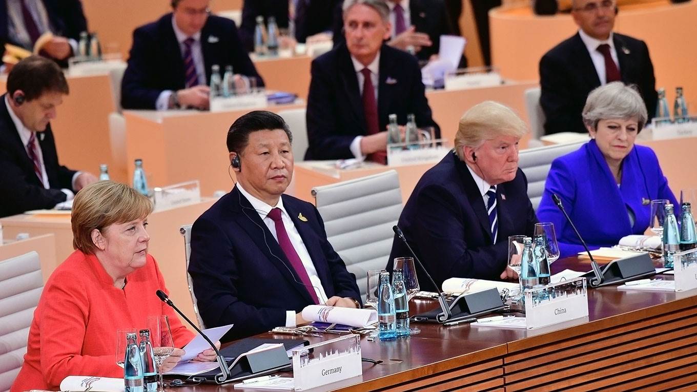 Angela Merkel speaks at the beginning of the first working session of the G20 Nations Summit