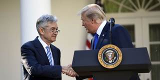 US President Donald Trump shakes hands as he announces his nominee for Chairman of the Federal Reserve