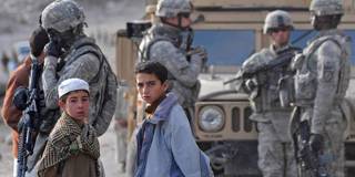 bildt92_ TAUSEEF MUSTAFAAFP via Getty Images_soldiers civilians afghanistan