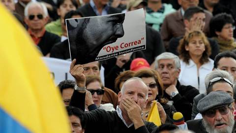 People protest against Rafael Correa government