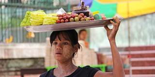 Woman in Burma selling fruit