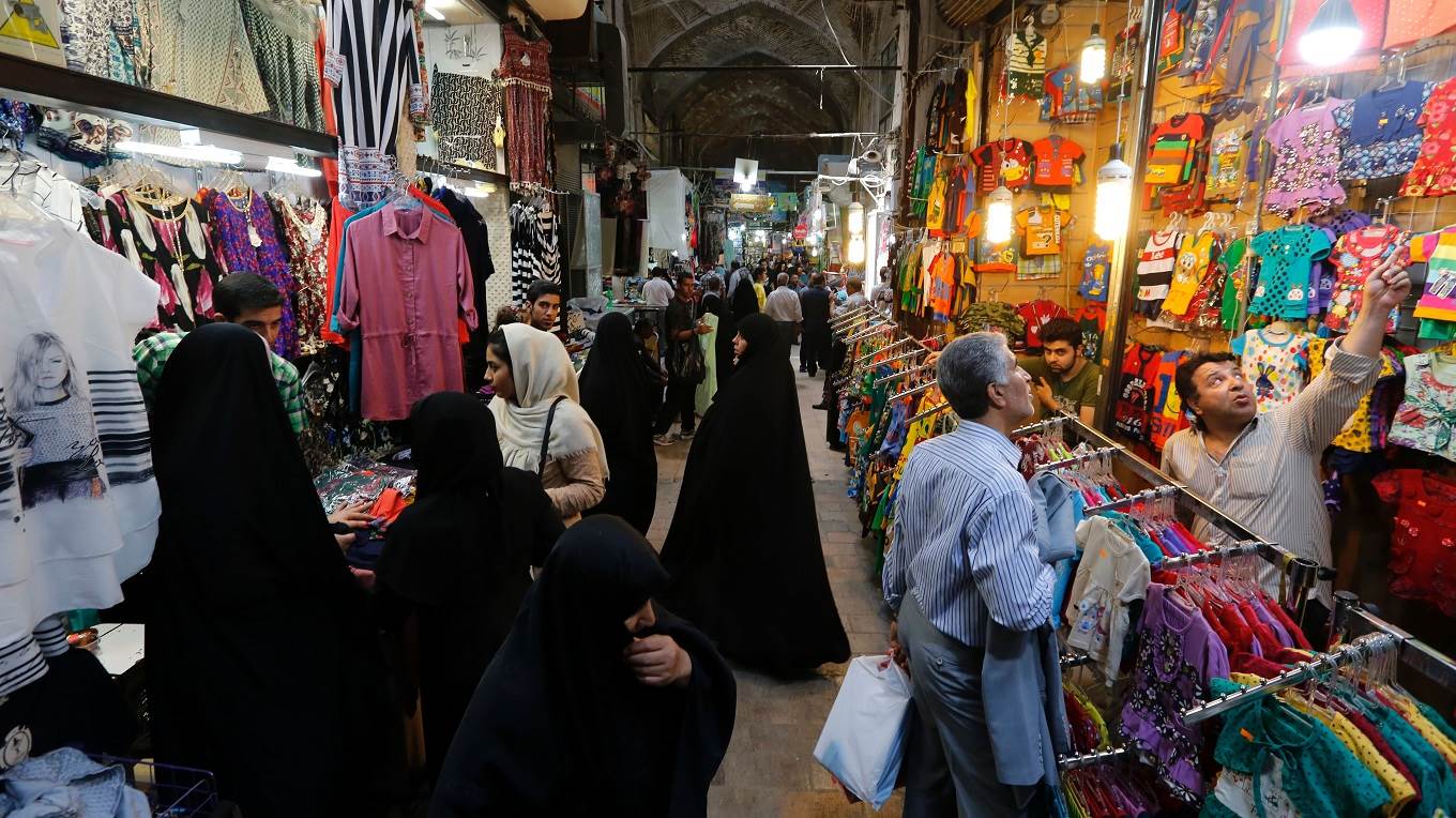 Iranians shop in Tehran's ancient Grand Bazaar