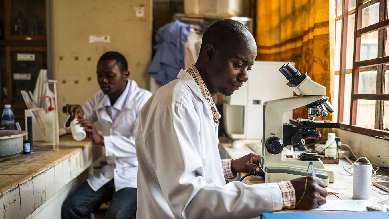 Students work at a laboratory at the Catholic University of Graben in Butembo