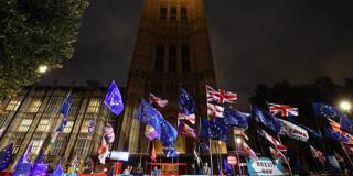 patten108_Jonathan BradyPA Images via Getty Images_UKflagsparliamentbrexit