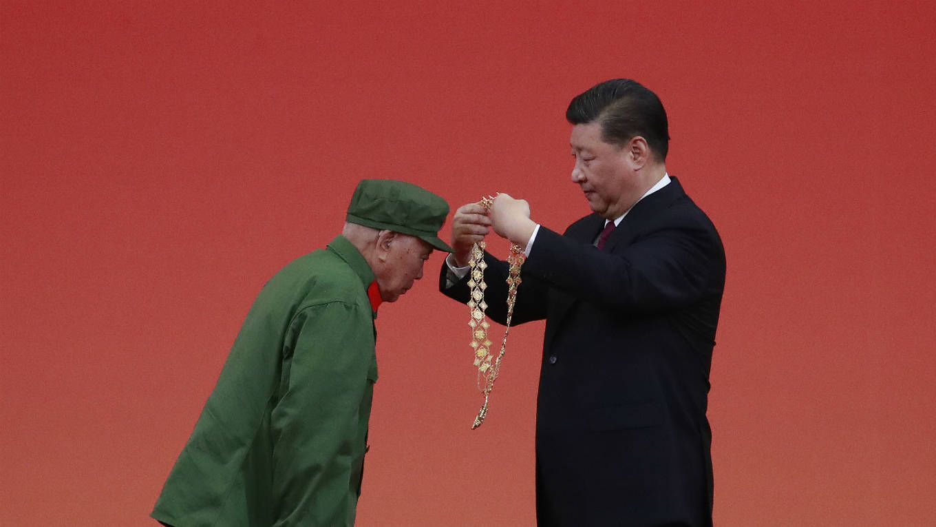 jin19_HowHweeYoungPoolGettyImages_jinping70celebration