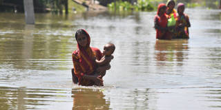 chowdhury1_BIJU BOROAFP via Getty Images_india flooding