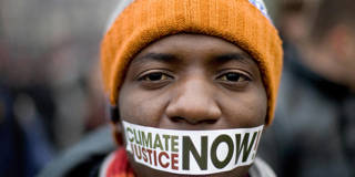 dervis91_WOJTEK RADWANSKIAFPGetty Images_climate protest