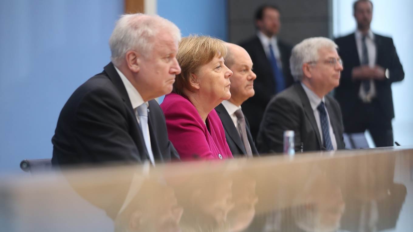 Angela Merkel, Acting Chairman of SPD Olaf Scholz and Chairman of CSU Horst Seehofer