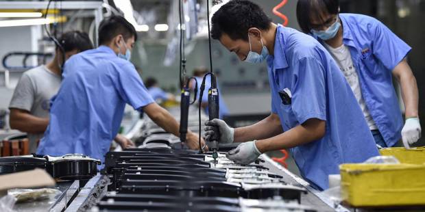 coyle25_STRAFP via Getty Images_factory china