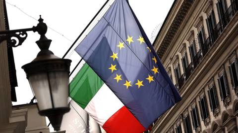  European Union (EU) and Italian national flag banners hang in central Rome