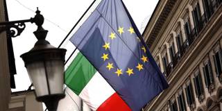  European Union (EU) and Italian national flag banners hang in central Rome
