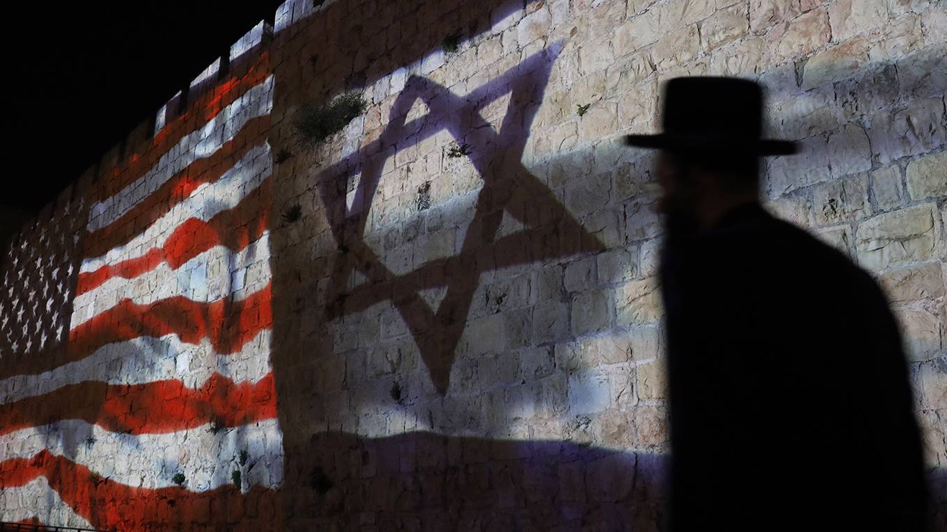 araud1_AHMAD GHARABLIAFPGetty Images_USisraelflagshadow