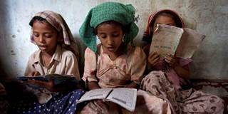 Rohingya students read the Koran