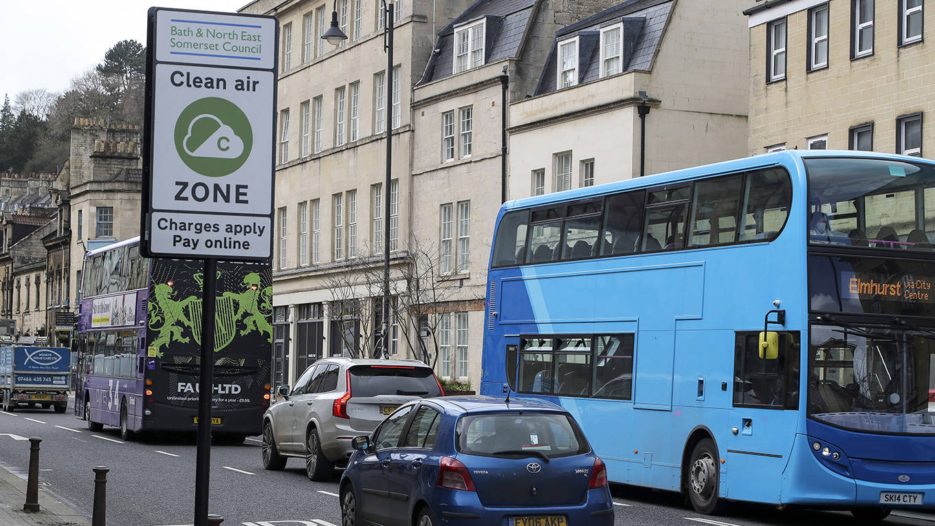 cliffe6_GEOFF CADDICKAFP via Getty Images_greentaxcar