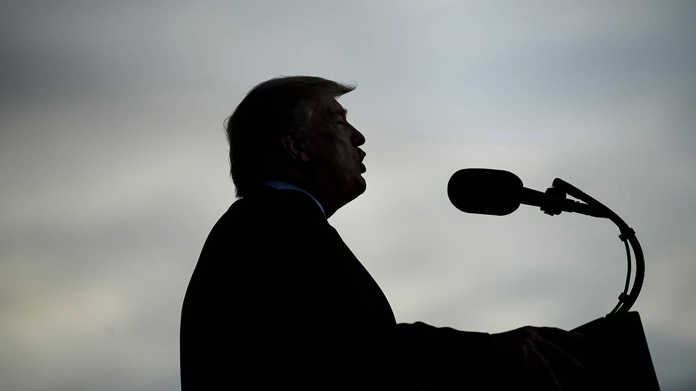 khrushcheva120_BRENDAN SMIALOWSKIAFP via Getty Images_trumpshadowstormsilhouette