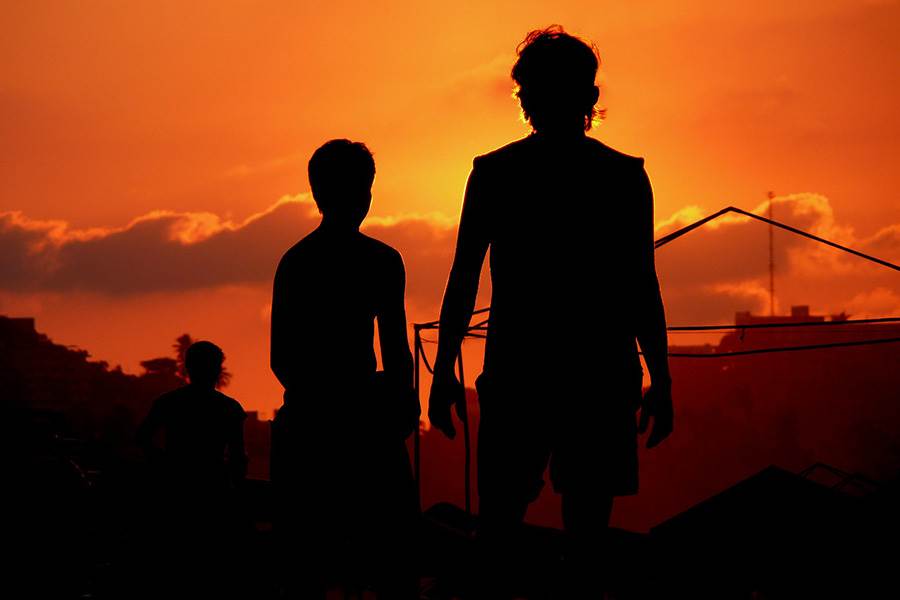 Two men in Mexico at sunset.