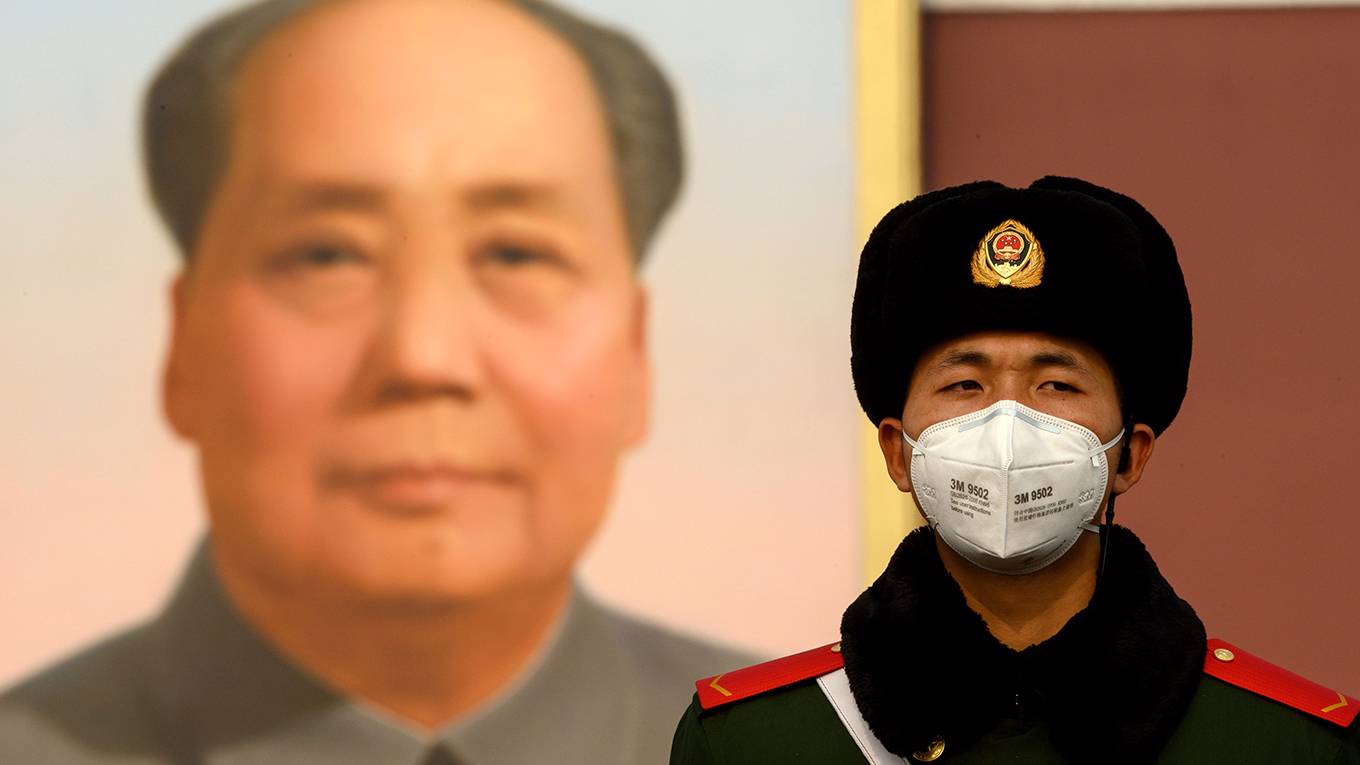 pei61_NOEL CELISAFP via Getty Images_chinacoronaviruspolicepropoganda