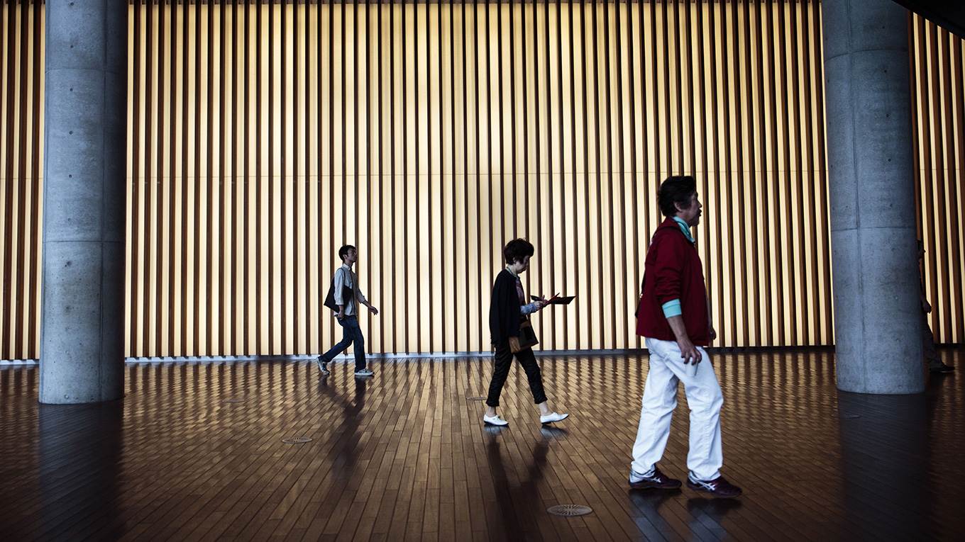 Japan visitors walk