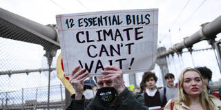 moec1_KENA BETANCURAFP via Getty Images_climatechangeprotest
