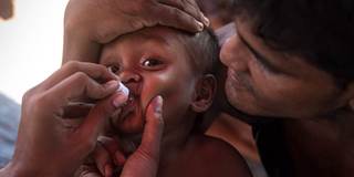 Vaccinators give the oral cholera vaccine to Rohingya 