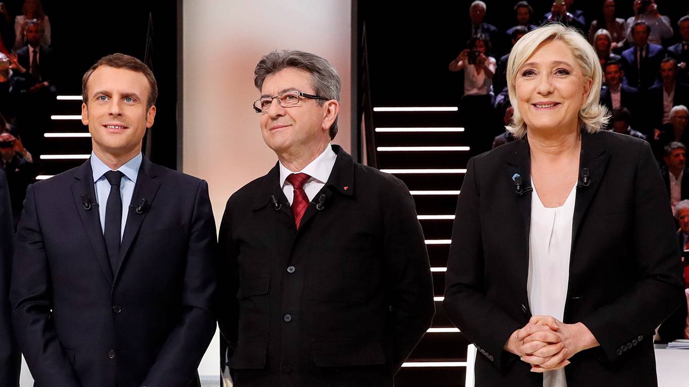 velasco121_PATRICK KOVARIKAFP via Getty Images_macronlepenmelenchon