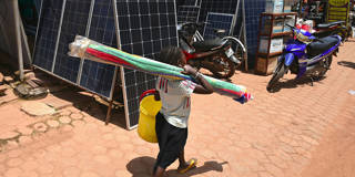 lawson1_ISSOUF SANOGOAFP via Getty Images_africagirlsolarpanel