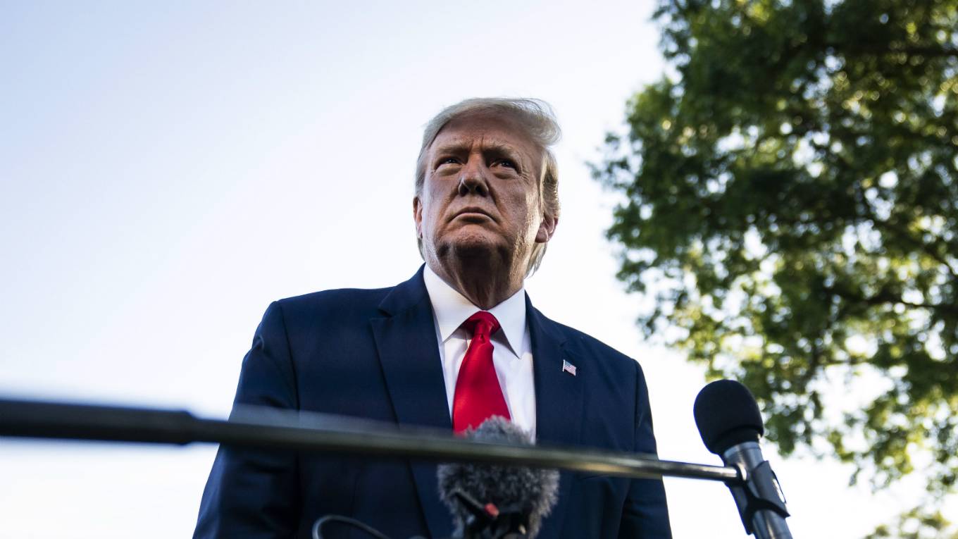 haass106_Jabin BotsfordThe Washington Post via Getty Images_trumpmicrophonesshadow