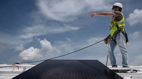 krueger55_ANDREW CABALLERO-REYNOLDSAFP via Getty Images_solar panels