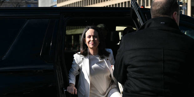Venezuelan opposition leader María Corina Machado steps out of a vehicle near the White House in Washington, D.C., ahead of a scheduled meeting with U.S. President Donald Trump on January 15, 2026.