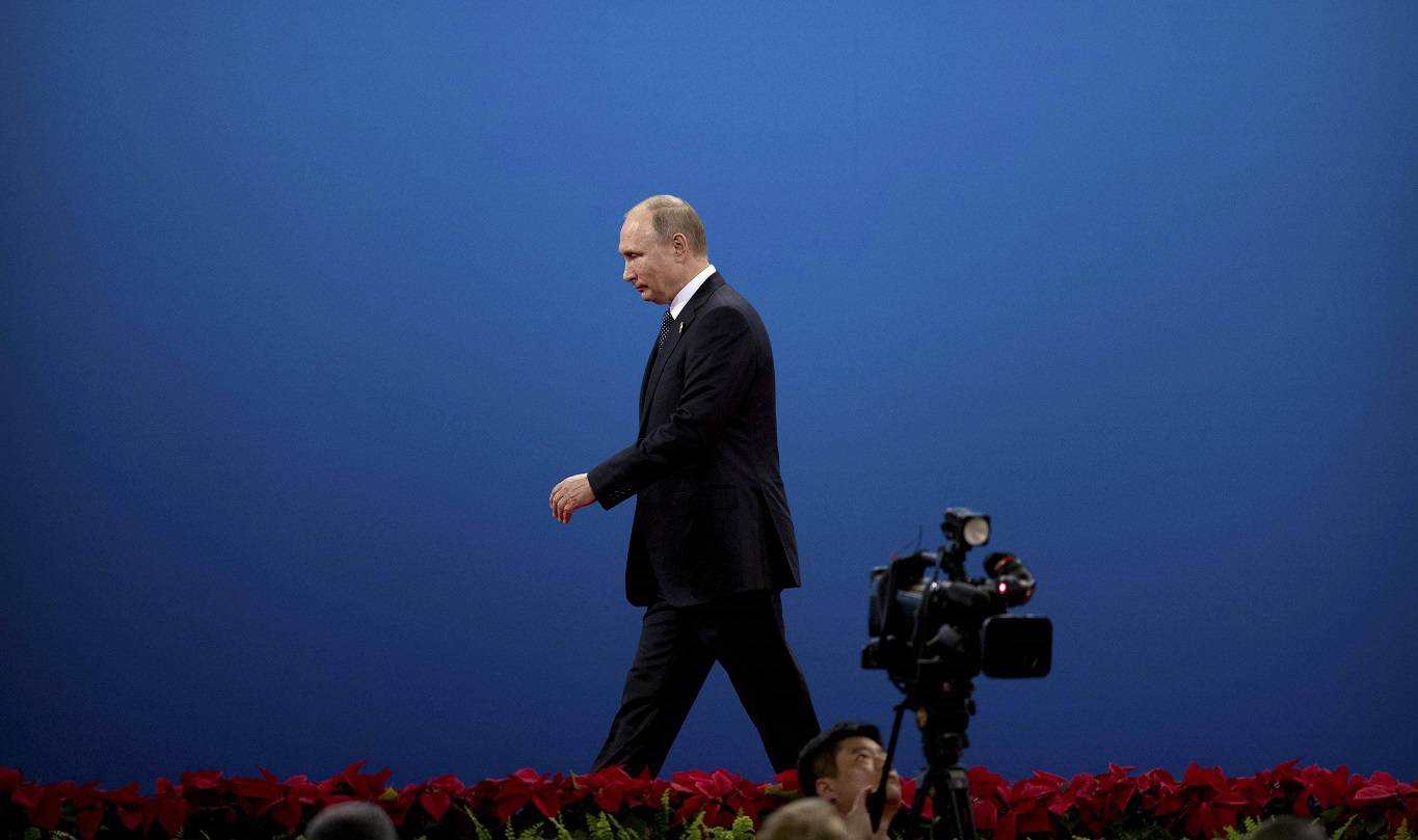 skidelsky177_Mark Schiefelbein-PoolGetty Images_putin walking